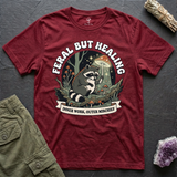 Feral But Healing tee in Cardinal Red, flat-lay