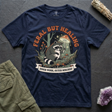 Feral But Healing tee in Navy, flat-lay